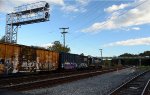 CSX local L206 heads east toward Sandy Hook Yard.  US 29 Business, Carter Glass Bridge, looms ahead.